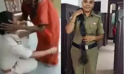 గుండు కొట్టించుకున్న మహిళా పోలీస్ అధికారి.. సెల్యూట్ చేయాల్సిందే ! గుండు కొట్టించుకున్న మహిళా పోలీస్ అధికారి.. సెల్యూట్ చేయాల్సిందే !