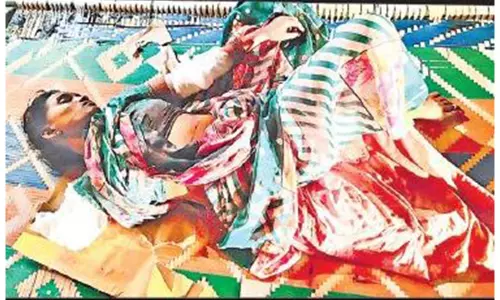 భార్య చేతులను నరికిన భర్త