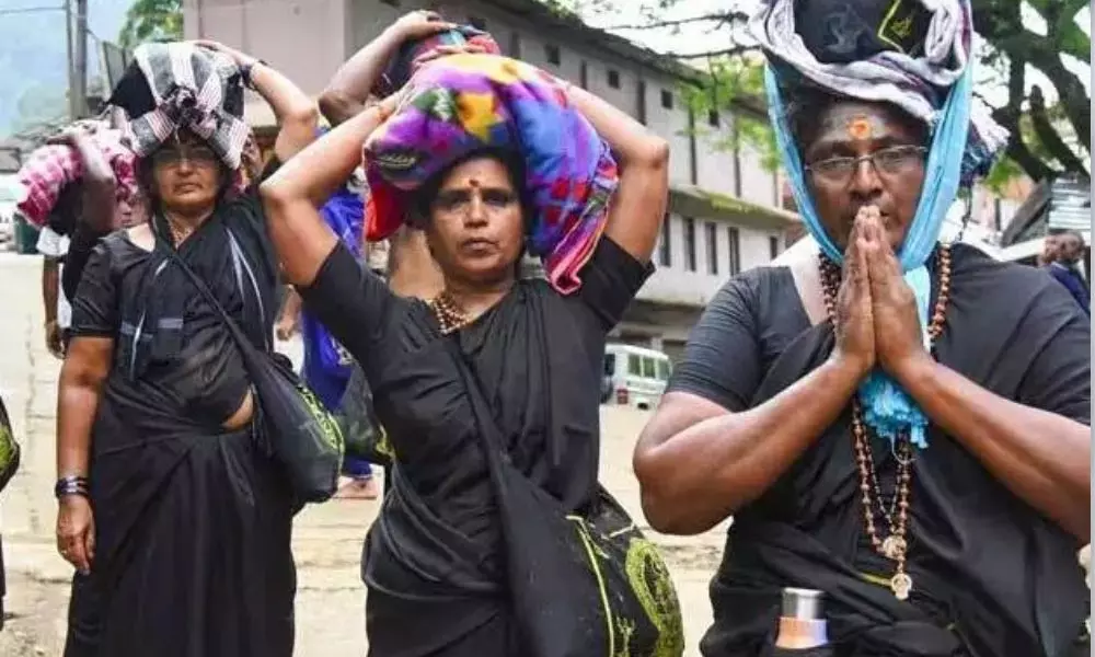 Kerala cops block entry of women below 50