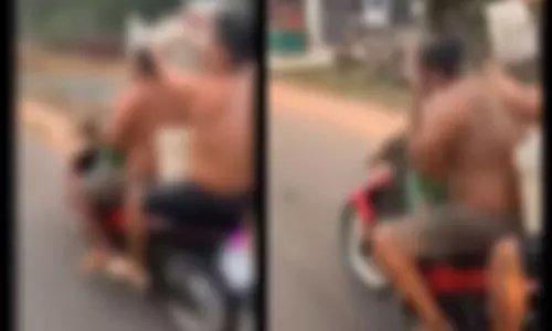 బైక్ నడుపుతూ జలకాలు: 5,500 జరిమానా