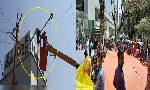 క్వార్టర్ ఇస్తే కరెంట్ పోల్ దిగుతా.. లేదంటే వైర్ తాకి చస్తా..మందుబాబు హల్‌చల్