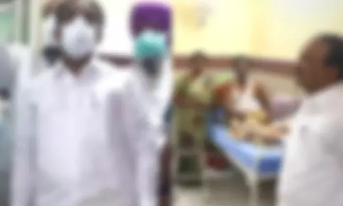 Minister Etela Rajender met coronavirus patient in Gandhi hospital Hyderabad