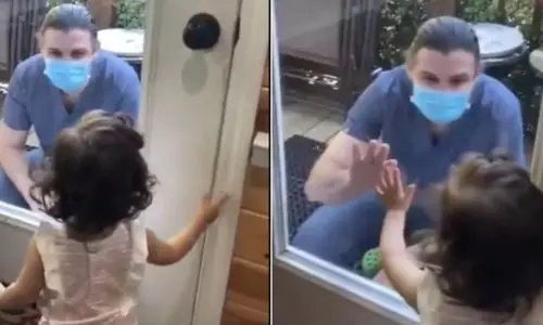 కరోనా ఎఫెక్ట్ : తండ్రిని కలుసుకోలేని బిడ్డ.. చూస్తే కనీళ్లు ఆగవు..