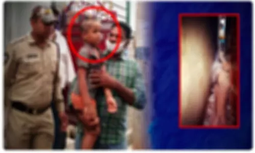 గోడలో ఇరుక్కున్న బాలుడు... కాపాడిన పోలీసులు