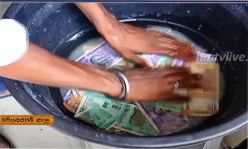 Coronavirus: డెటాల్‌ వాటర్‌లో డబ్బులు వాష్‌