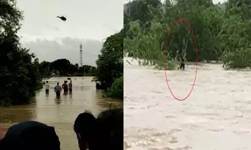 లారీ డ్రైవర్‌ గల్లంతు.. హెలికాప్టర్‌తో గాలింపు