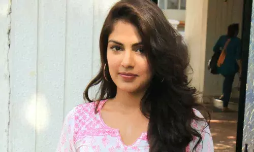 ఇంటిపక్కన మహిళపై చర్యలు తీసుకోవాలన్న రియా