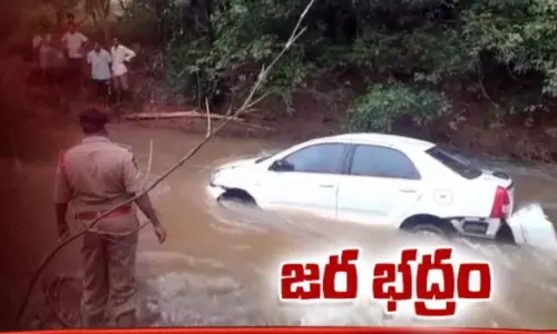 వరద నీటిలో తండ్రీకూతుళ్లు గల్లంతు