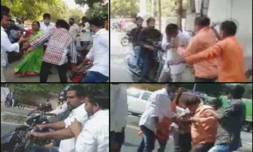 నడి రోడ్డు మీద బీజేపీ నేతల కుమ్ములాట