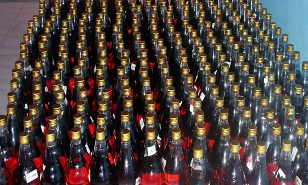Liquor bottles Spotted in village volunteer Home Visakhapatnam