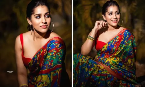 Anchor Rashmi Gautam in Red Flaming Saree Photos