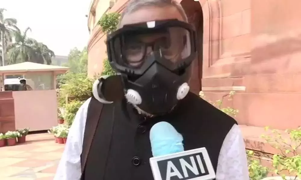 Konda Vishweshwar Reddys Unique Mask Creates a Buzz in the Parliament Sessions