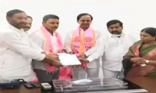 CM KCR Handover B Form to Nomula Bhagath