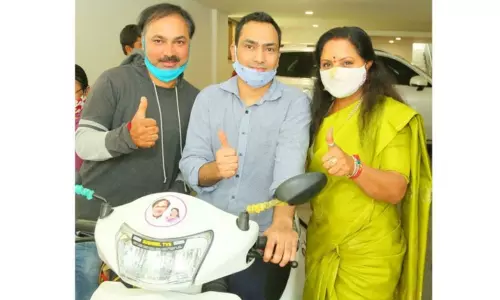 MLC Kavitha Donates Scooters to Handicapped People MLC Kavitha Donates Scooters to Handicapped People