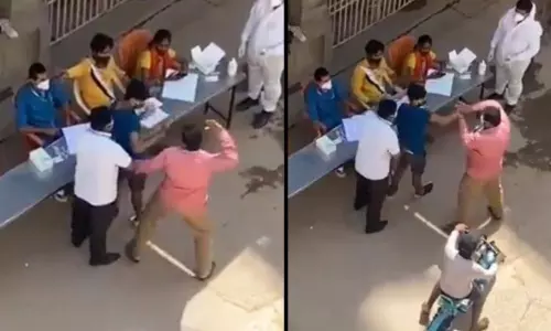 Bangalore Teenager Boy Brutally Beaten by BBMP Officials for Refusing Corona Test Caught on Video Bangalore Teenager Boy Brutally Beaten by BBMP Officials for Refusing Corona Test Caught on Video