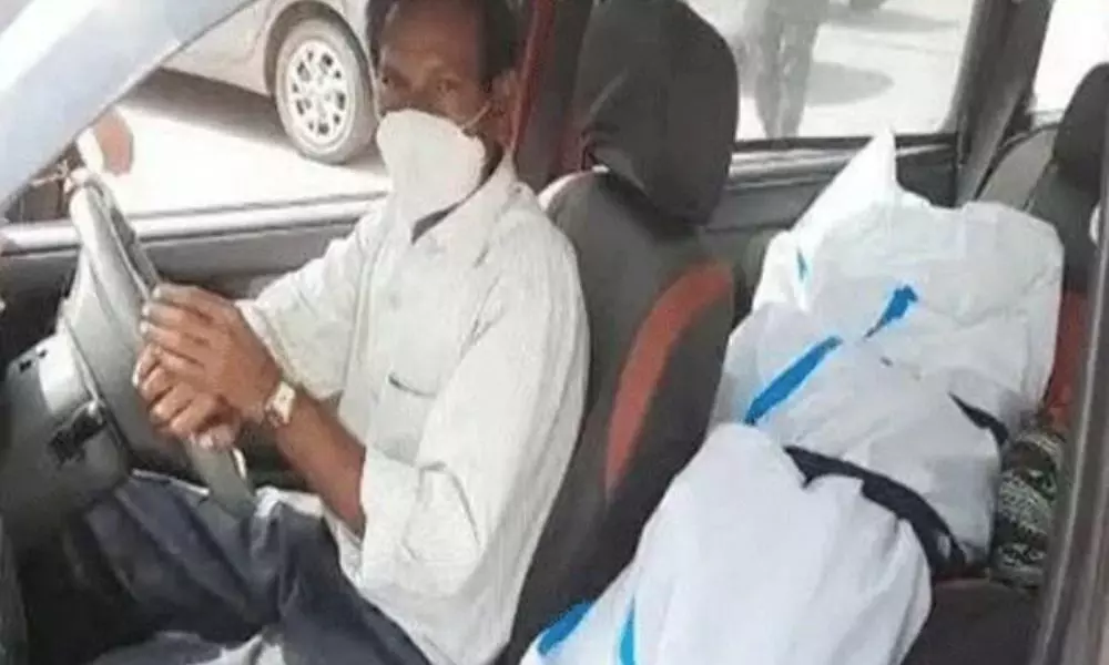 Man Ties Daughters Ddead Body to car Seat as Ambulance Demands Exorbitant Fees