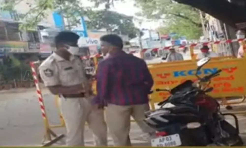 Two Constables Fight on Road in Madanapalle