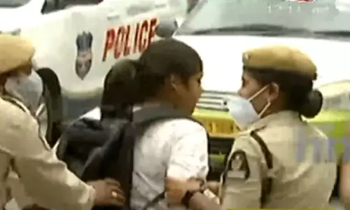 Young Woman Highlight in Front of Pragati Bhavan