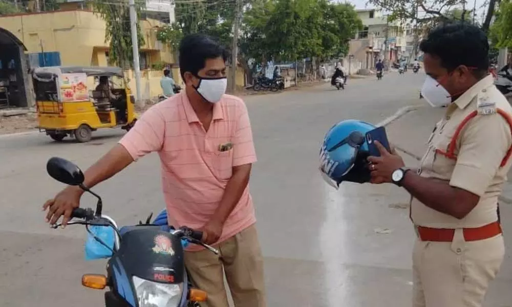 Krishna District Police Filed Cases on Cops Who are not Wearing Helmet