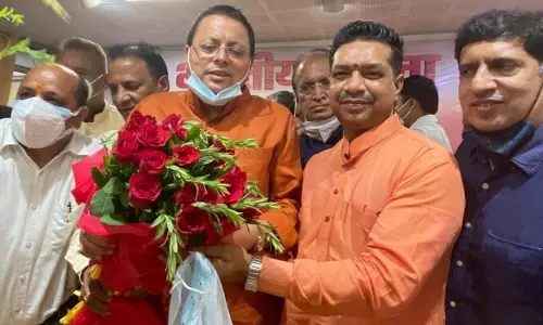Pushkar Singh Dhami Takes Tath as Uttarakhand CM Pushkar Singh Dhami Takes Tath as Uttarakhand CM