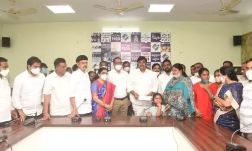 AP Minister Dharmana Krishnadas Gives 50 Lakh Cheque To Jawan Uma Maheswara Rao Family