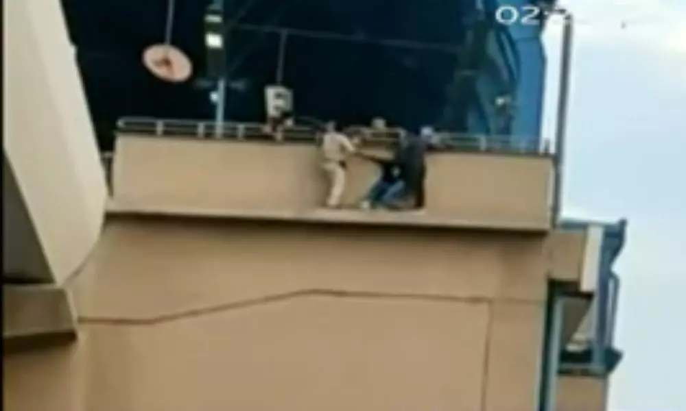 Woman Trying to Jump From Metro Station in Delhi