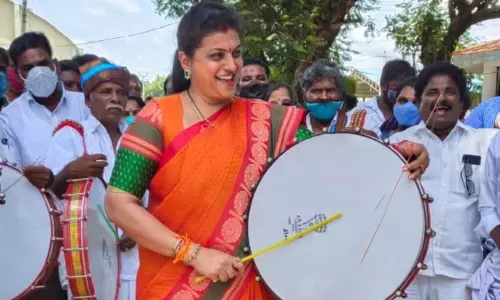 MLA Roja Beaten Drums at Puttur Municipality in Chittoor