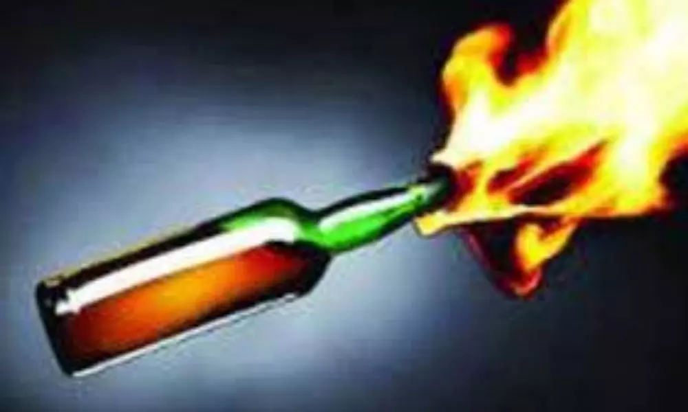 Attack with Petrol on Mobile Shop Owner in Hanamkonda District