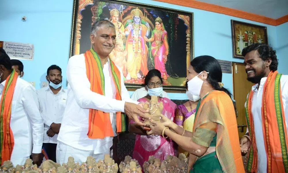 Minister Harish Rao Distributed Clay Ganesh Idols in Siddipet