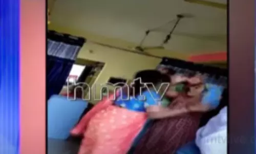 A Woman Attack on Nizamabad Corporator Husband A Woman Attack on Nizamabad Corporator Husband