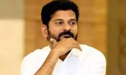 TPCC Chief Revanth Reddy Tweets about Illegal Structures at Gem Avenue in Uppal Kalan Hyderabad