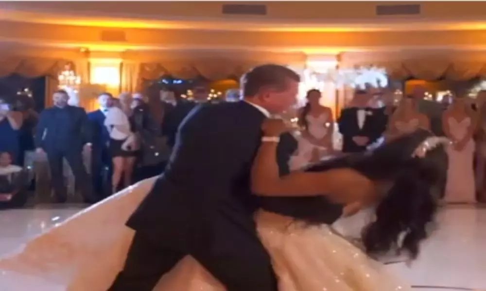 The Bride and Groom who Fell Under the Wedding Reception Viral Video