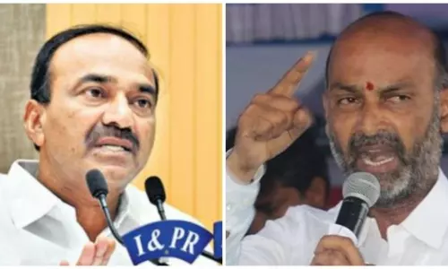 Etela Rajender Meets Bandi Sanjay in Karimnagar Parliament Office Etela Rajender Meets Bandi Sanjay in Karimnagar Parliament Office