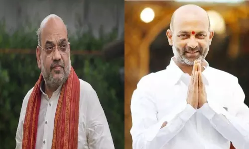 Union Home Minister Amit Shah Called to BJP President Bandi Sanjay to know the Details of Nalgonda Incident Union Home Minister Amit Shah Called to BJP President Bandi Sanjay to know the Details of Nalgonda Incident