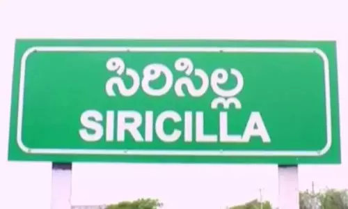 Farmers Strike at Sircilla Kamareddy Highway to Buying Paddy Grain