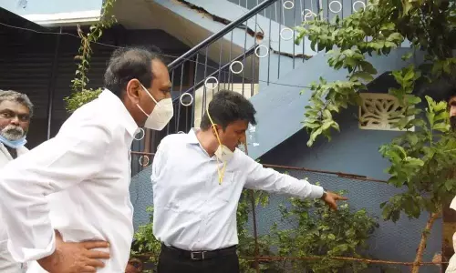 Engineers Inspect the Inspect a Cracked Building in Sri Krishnanagar