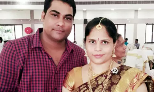 After her husband died a wife jumped into a large pond with her two children