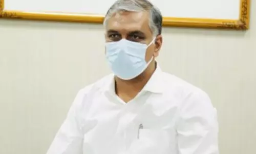 Harish Rao Letter to Union Health Minister Mansukh Mandaviya Over Booster Dose Harish Rao Letter to Union Health Minister Mansukh Mandaviya Over Booster Dose
