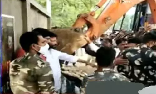 The Removing the Retaining Wall as part of Widening the Road
