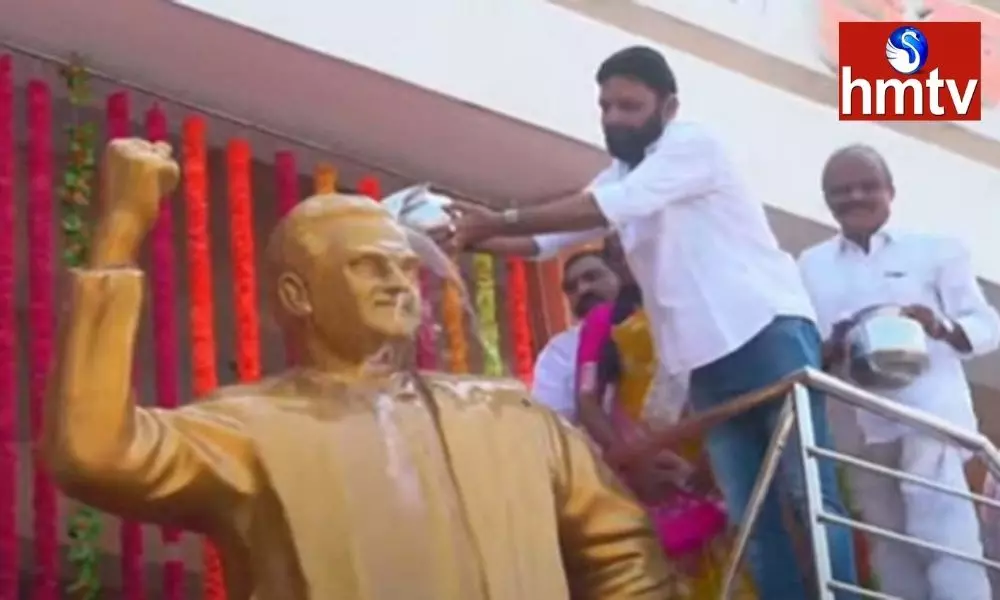 Kodali Nanis Anointing to the NTR Statue