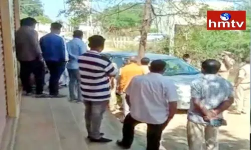 The Driver opened fire while Taking money out of the car