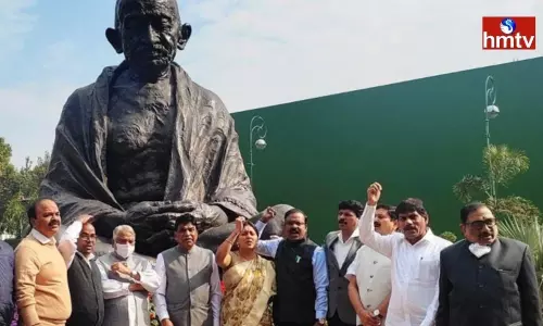 TRS MPs protest at Gandhi statue on Parliament Premises TRS MPs protest at Gandhi statue on Parliament Premises