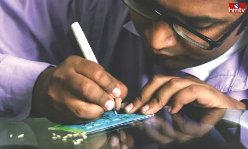 Micro Artist Of Sri Rama Pattabhishekam Ghattam on Rice Grain | Live News Micro Artist Of Sri Rama Pattabhishekam Ghattam on Rice Grain | Live News