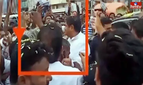 AP Minister Dharmana Prasada Rao Beats YSR party Activist