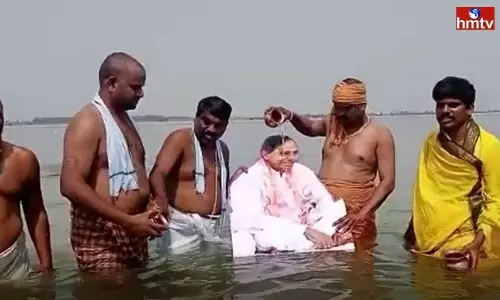 Pranahitha Pushkaralu Bath for CM KCR Photo