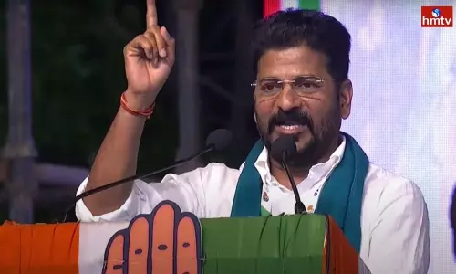 Revanth Reddy Tweets on Allotment of Expensive Space for TRS District Party Office