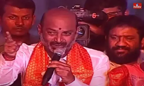 BJP Chief Bandi Sanjay Challenge to Asaduddin Owaisi in Karimnagar