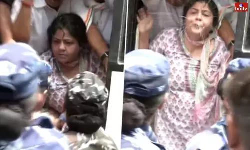 Mahila Congress President Netta DSouza Spits at Police Personnel Mahila Congress President Netta DSouza Spits at Police Personnel