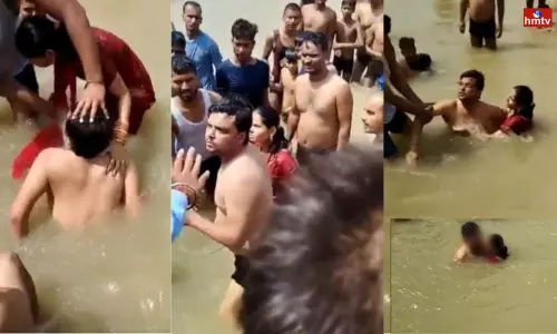 Angry Mob Beats Man for Kissing wife in Ayodhya Ghat Angry Mob Beats Man for Kissing wife in Ayodhya Ghat