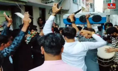 Young Men Dance With Talwars At Old City Barath Young Men Dance With Talwars At Old City Barath